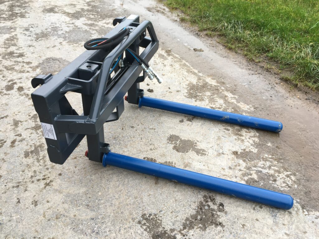 New A to Z Round bale handler, tines inside removable rollers, euro 8 brackets and pipes