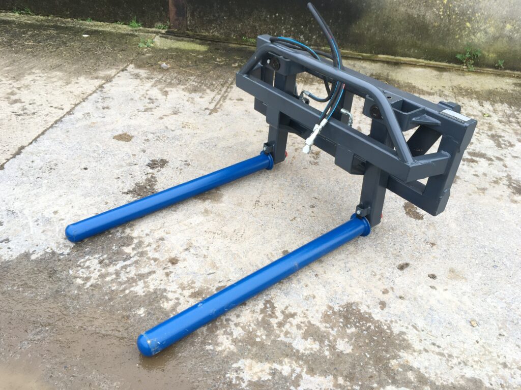 New A to Z Round bale handler, tines inside removable rollers, euro 8 brackets and pipes