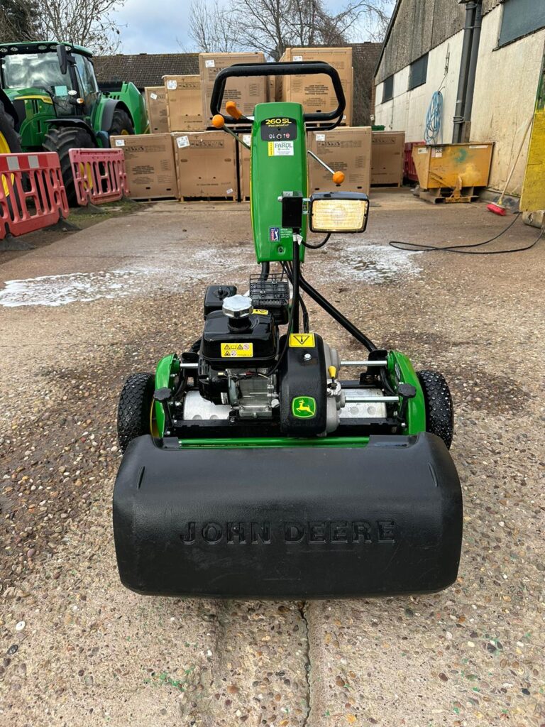 John Deere 260SL tees mower