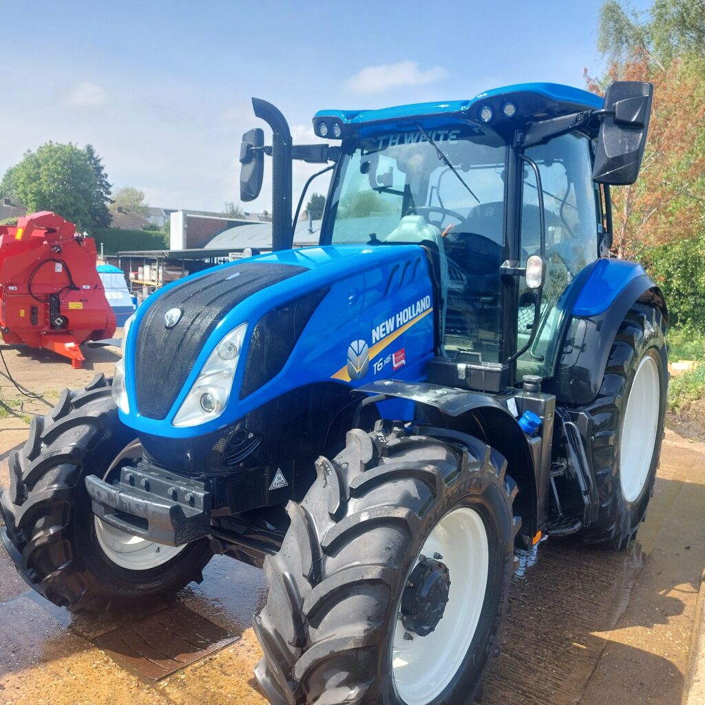 NEW HOLLAND 145 EC