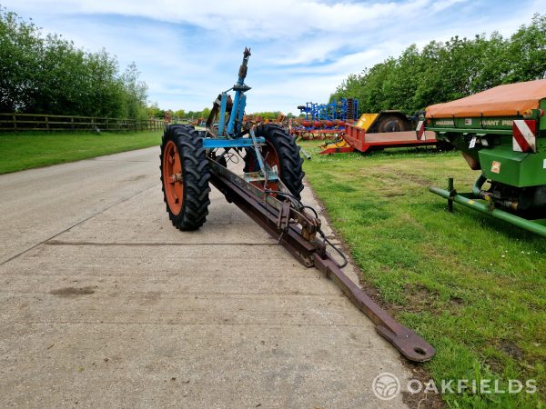 Trailed hydraulic cable lift mole drainer