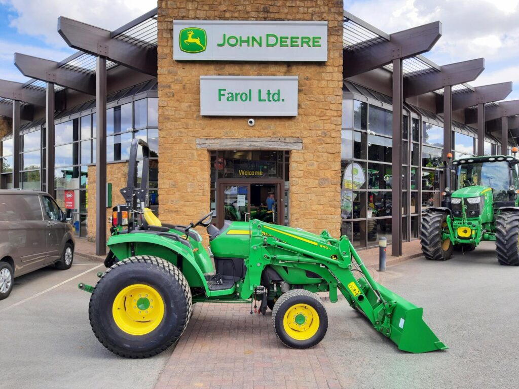 John Deere 4066M and 440R loader compact tractor