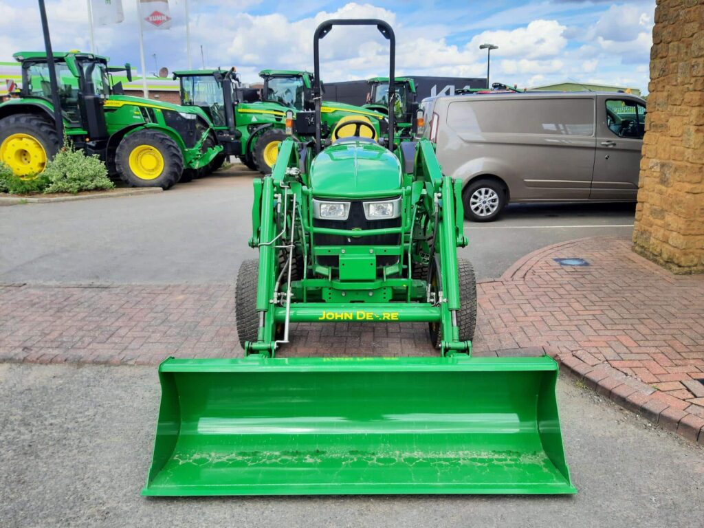 John Deere 4066M and 440R loader compact tractor