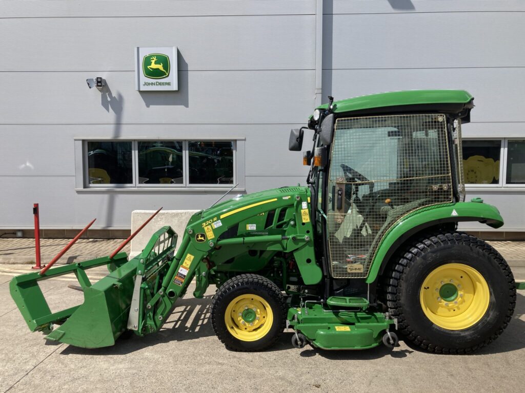 John Deere 3046R compact tractor with loader and mid deck