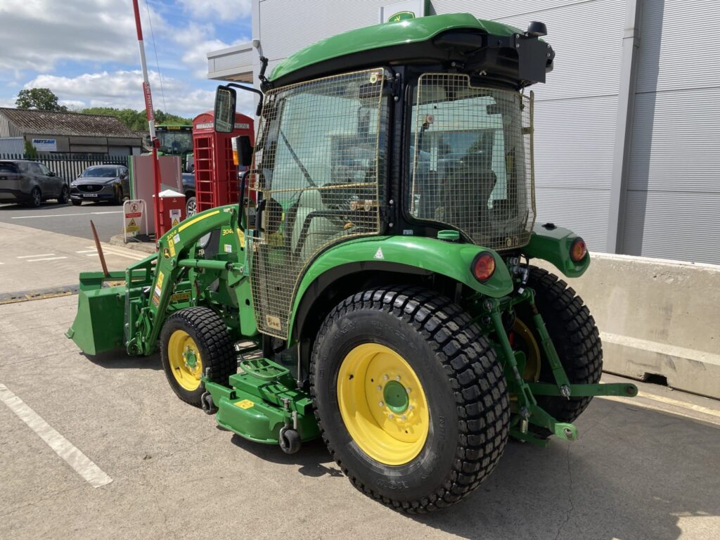 John Deere 3046R compact tractor with loader and mid deck