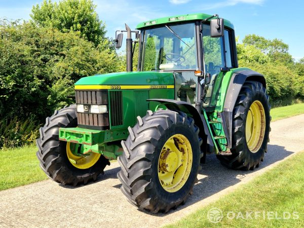 1999 John Deere 6910 4WD Tractor